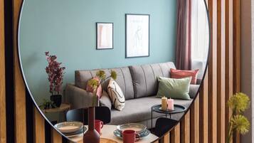 Comfort Apartment, City View | Living area | 50-inch Smart TV with cable channels, Netflix, streaming services