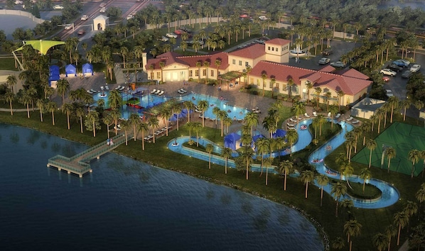 A resort with a large pool area, a dock, and a building with a red roof.