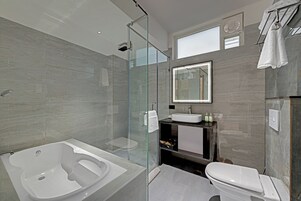 Premium bedding, memory-foam beds, minibar, in-room safe