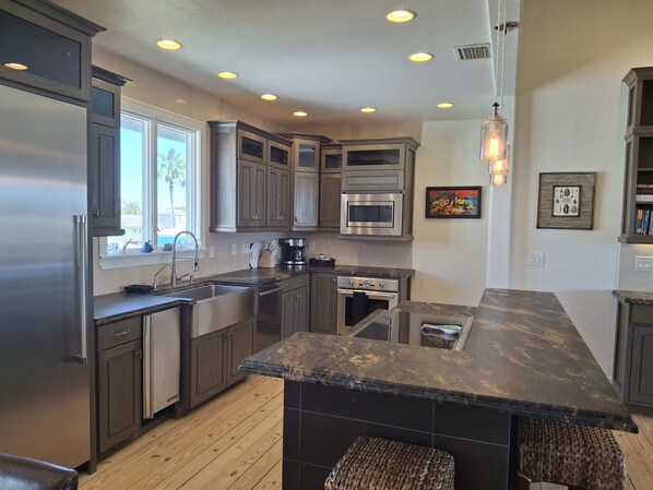 Fridge, microwave, dishwasher, coffee/tea maker