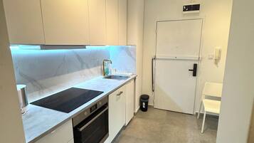 Apartment, 4 Bedrooms | Private kitchen | Coffee/tea maker