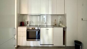 Apartment, 4 Bedrooms | Private kitchen | Coffee/tea maker