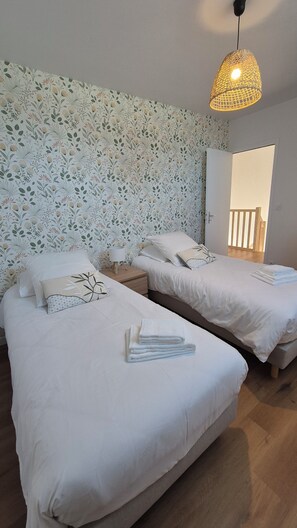 2 bedrooms, desk, iron/ironing board, travel crib