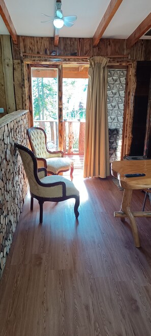 Cabaña familiar | Área de sala de estar