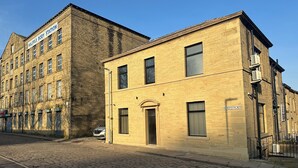 A two-story building with a sign reading "Halifax Body Station". - Akroyd House - The Dean Clough Room, A brand new stunning guest house, town centre location with par (Halifax)
