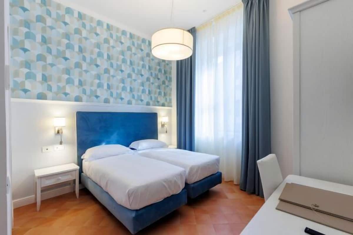 Desk, free WiFi, bed sheets