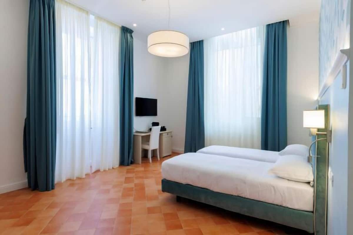 Desk, free WiFi, bed sheets