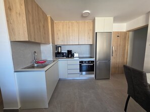 Family Apartment, Partial Sea View | Private kitchen | High chair - Two-Bedroom Suites by Kentrikon 1924 Boutique Hotel, Old Town (Paphos)