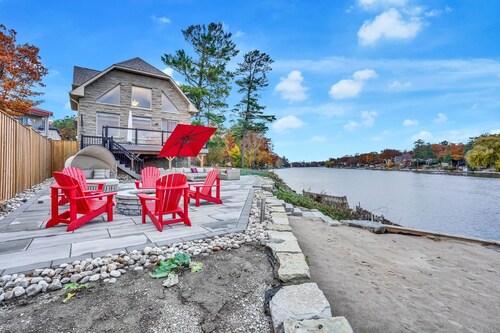 EXECUTIVE WATERFRONT LIVING AT ITS FINEST!!! WELCOME to this immaculate home!