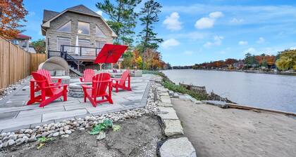 EXECUTIVE WATERFRONT LIVING AT ITS FINEST!!! WELCOME to this immaculate home!