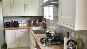 Coffee/tea maker, fridge, microwave, oven