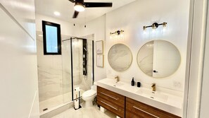 Shower, hair dryer, towels, soap