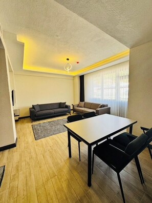 Familienapartment, Stadtblick | Wohnbereich