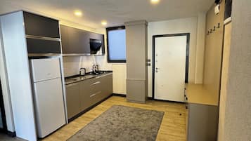 Apartamento familiar, vistas a la ciudad | Zona de estar