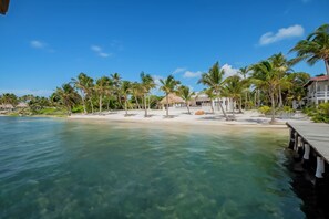 On the beach, sun loungers, beach towels
