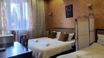 Superior Triple Room | Minibar, individually decorated, individually furnished, desk