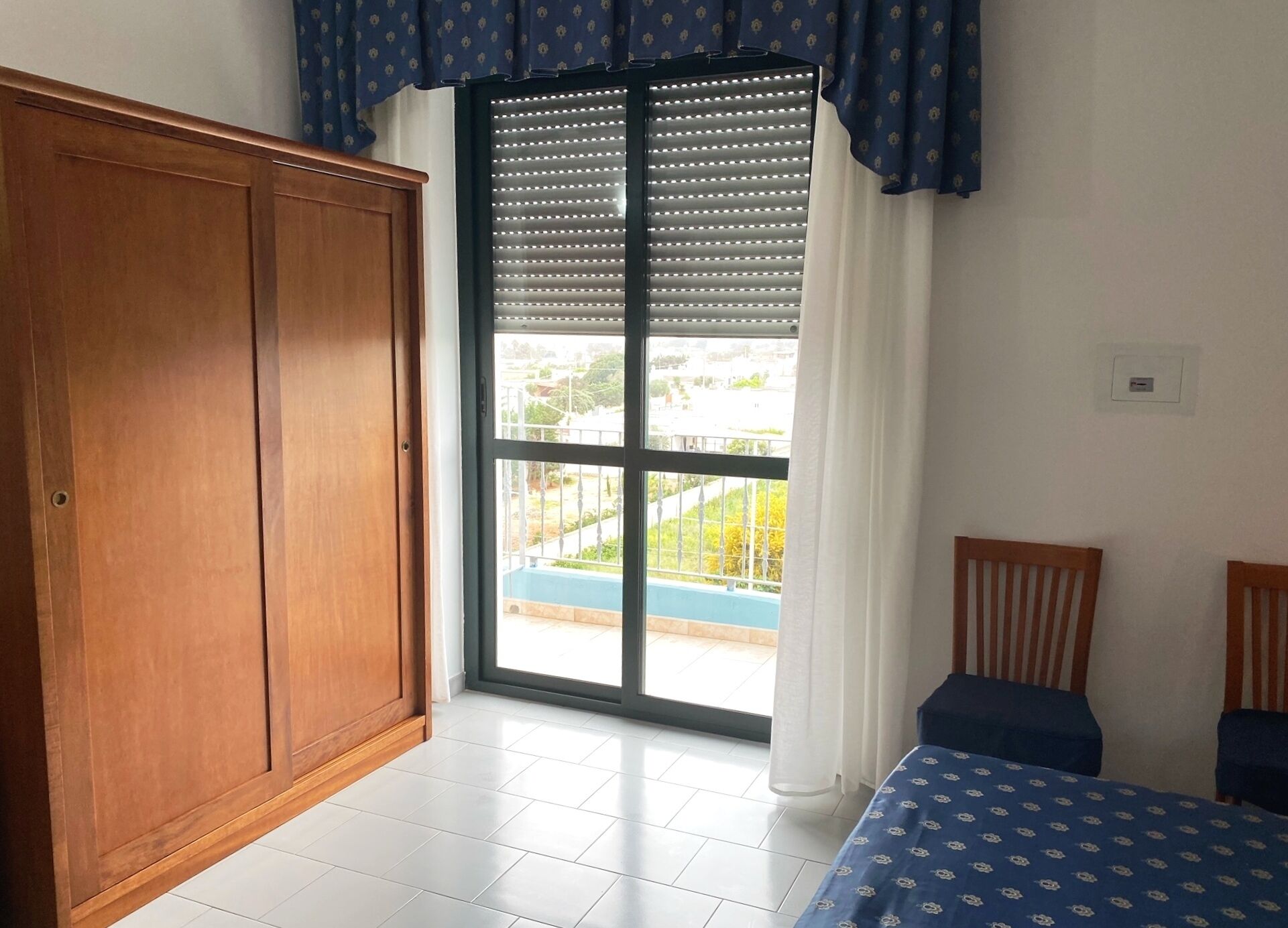 Family Quadruple Room, Balcony | In-room safe, desk, laptop workspace, blackout curtains