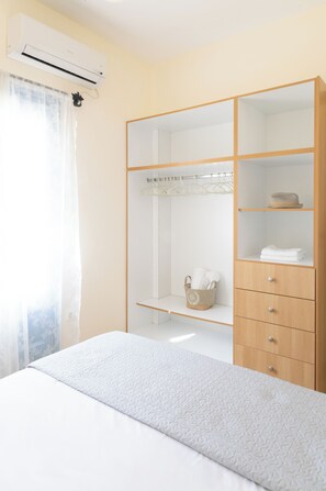2 dormitorios, tabla de planchar con plancha, wifi y ropa de cama