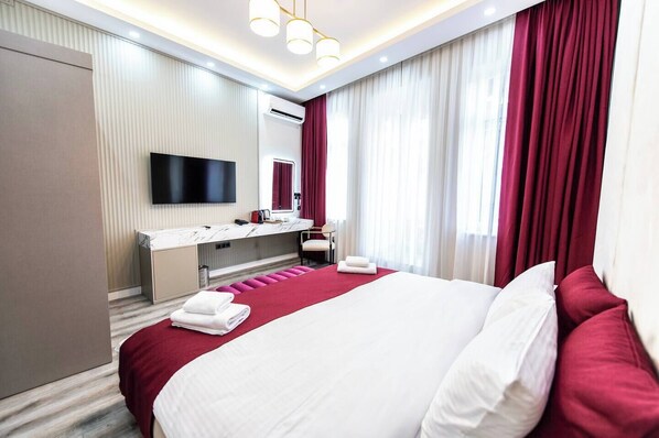 1 habitación, tabla de planchar con plancha y wifi