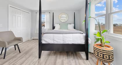 FULLY RENOVATED apt w/water views and deck near beach& marina