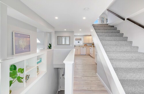 FULLY RENOVATED apt w/water views and deck near beach& marina