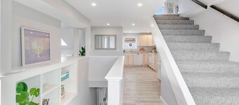 FULLY RENOVATED apt w/water views and deck near beach& marina