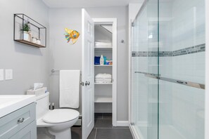Hair dryer, towels, soap, shampoo