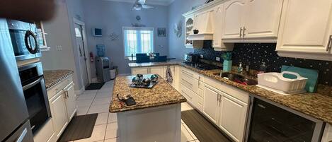 Highchair, cookware/dishes/utensils, spices