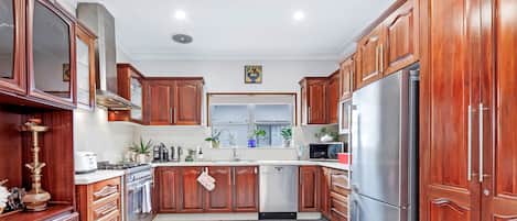City House, 2 Bedrooms (NRO147) | Private kitchen | Microwave, stovetop, cookware/dishes/utensils, dining tables