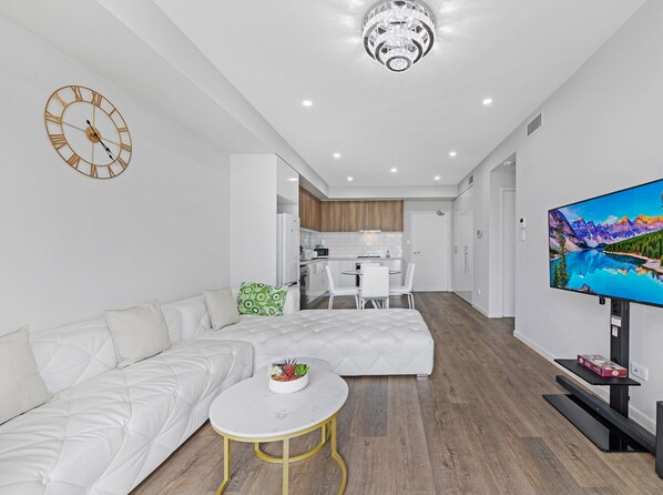 Flat-screen TV - Kozyguru | Wentworthville | 2 Bed 2 Bath Apt (Wentworthville)