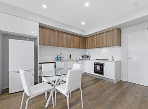 Apartment, 2 Bedrooms (NWE031-A) | Private kitchen | Fridge, microwave, oven, stovetop