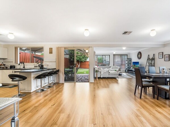 House (NWH023) | Living area - Kozyguru | West Hoxton | Spacious 7-Person Home With Backyard (West Hoxton)