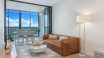 Apartment, 1 Bedroom (NWP017-1705) | Living area | Flat-screen TV