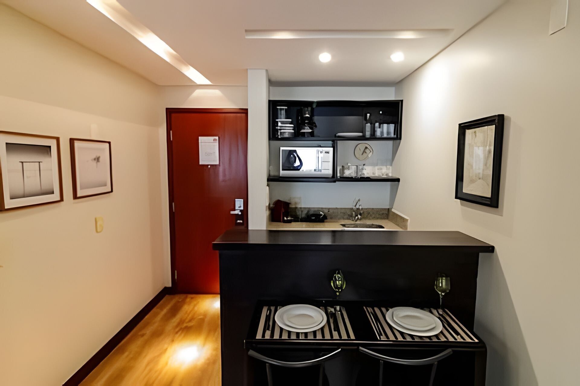 Apartamento básico | Cozinha privada | Frigobar, micro-ondas, cooktop, cafeteira/chaleira