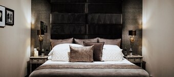 Luxury King Suite w/ Claw-Foot Tub | Private, Spacious, Speakeasy Access