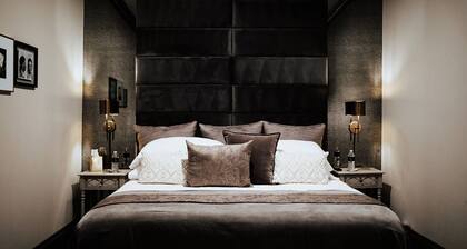 Luxury King Suite w/ Claw-Foot Tub | Private, Spacious, Speakeasy Access