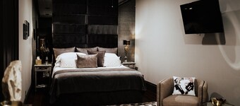 Luxury King Suite w/ Claw-Foot Tub | Private, Spacious, Speakeasy Access