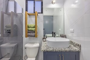 Shower, hair dryer, towels, soap