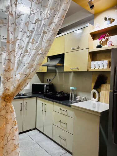 2bhk apartment with a cute kitchen and exclusive access to a private terrace. <3