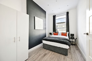 1 chambre, fer et planche à repasser, Wi-Fi gratuit, draps fournis
