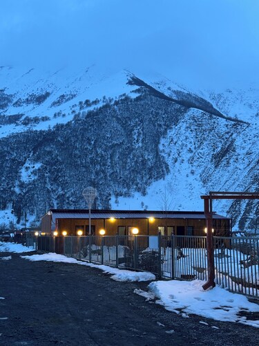 A studio apartment at a secluded area by the river, surrounded by mountains.