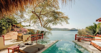 Beautiful beachfront villa with private beach. Chef, Waiter and Bartender.