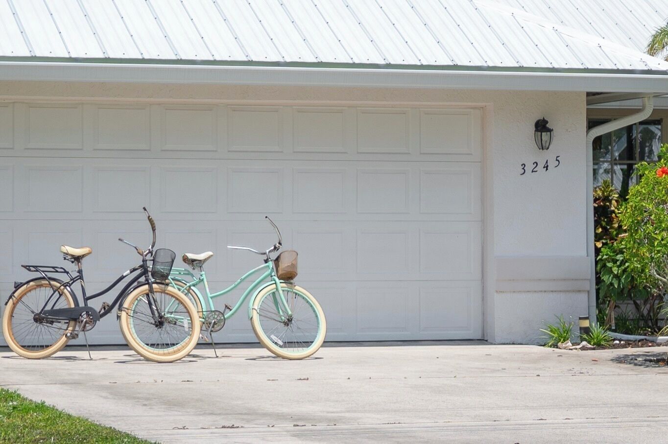 A garage with a bicycle parked in front.