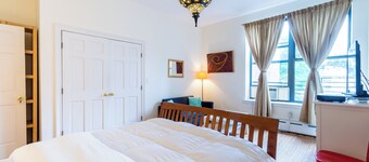 spacious quiet bright 2-bedroom 2 bathroom in a Harlem brownstone with AC, WiFi