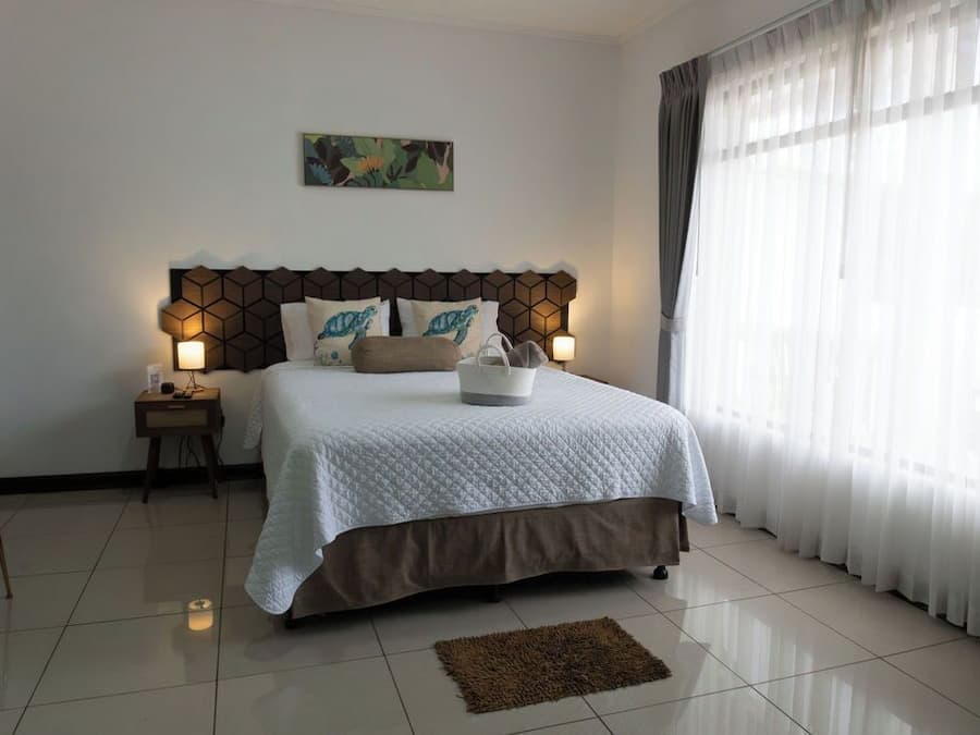 Deluxe Double Room Single Use, 1 Queen Bed with Sofa bed, Non Smoking, Private Bathroom | Premium bedding, down comforters, individually decorated