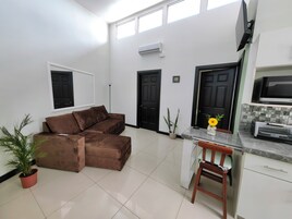 Family Apartment, 2 Bedrooms, Non Smoking, Kitchen | Living area | 27-inch Smart TV with digital channels