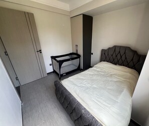 2 habitaciones, cuna de viaje, wifi gratis y ropa de cama 