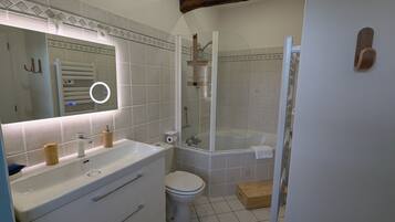 Eco-friendly toiletries, hair dryer, towels, soap