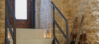 The Aura Stone Room: an oasis of charm, nestled in the heart of Corato in Puglia.