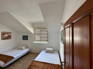 1 habitación, tabla de planchar con plancha, internet y ropa de cama 